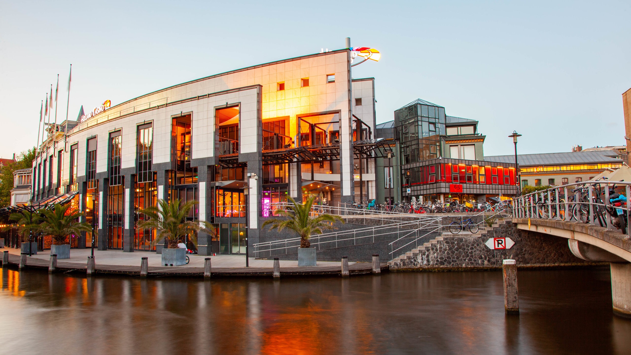 A cozy Dutch street cafe, representing 'gezellig'